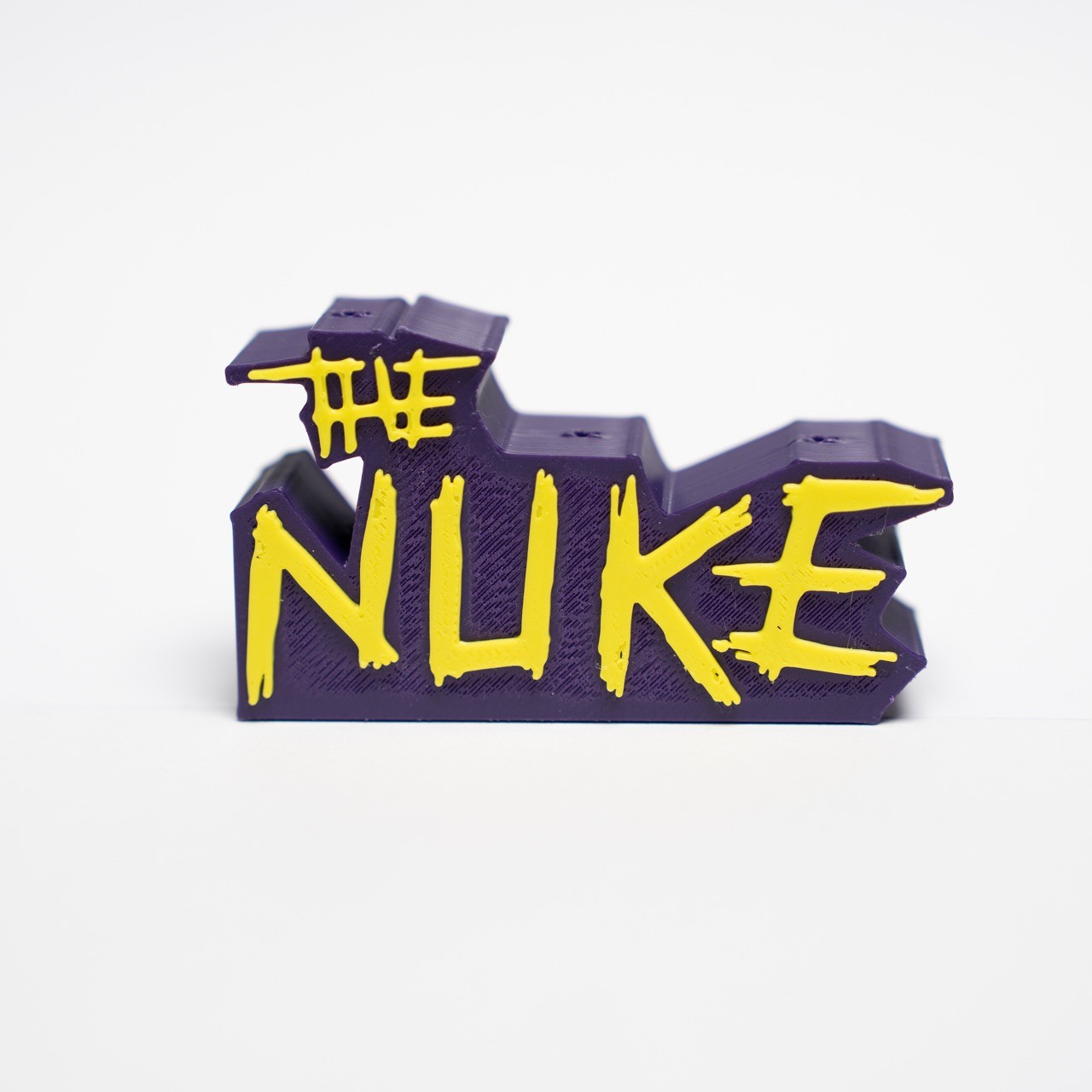 The Nuke Dartständer Luke Littler - Lila/Gelb